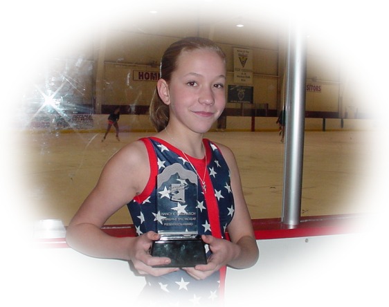 Anna with award -- click to view Anna's competitive history